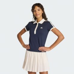 Koszulka Polo Tennis Classics. Niebieskie bluzki damskie Adidas, bez wzorów, sportowe, bez kołnierzyka, bez ramiączek. Za 219.00 zł.