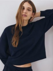 Bluza z dodatkiem modalu - granatowy. Niebieskie bluzy damskie Reserved, l, bez wzorów, z dzianiny, bez kaptura. W wyprzedaży za 59.99 zł.