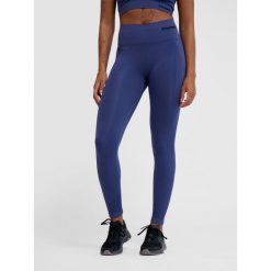 Damskie legginsy bezszwowe z wysoką talią Hummel TIF. Niebieskie legginsy damskie Hummel, bez wzorów. Za 143.00 zł.