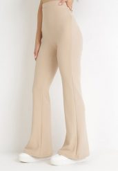 Beżowe Spodnie Dzwony z Gumką w Pasie Milica. Brązowe spodnie materiałowe damskie Born2be, bez wzorów, z jeansu. Za 89.99 zł.