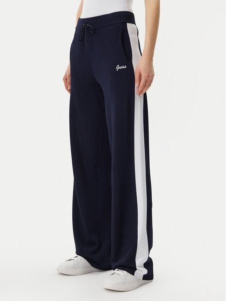 Guess Spodnie dresowe V5GB00 Z3D60 Granatowy Regular Fit. Niebieskie spodnie dresowe damskie Guess, xs, z aplikacjami, z dresówki. Za 459.99 zł.