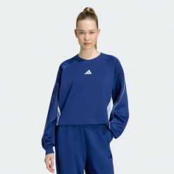 Bluza Stadium z zaokrąglonym dekoltem i 3 paskami. Niebieskie bluzy damskie Adidas, uniwersalny, bez wzorów, z bawełny, bez kaptura. Za 259.00 zł.