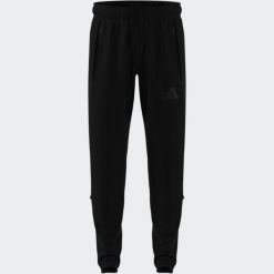 Spodnie piłkarskie ADIDAS Tiro Travel 26 treningowe. Spodnie dresowe damskie Adidas, l, bez wzorów, z dresówki. Za 289.99 zł.