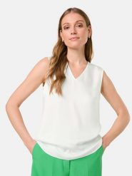 Gerry Weber Bluzka w kolorze kremowym rozmiar: 36. Brązowe bluzki damskie Gerry Weber, s, bez wzorów, z wiskozy, klasyczne, bez kołnierzyka, bez ramiączek. Za 92.21 zł.