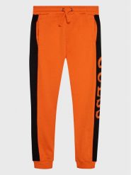 Guess Spodnie dresowe N3RQ12 KA6R3 Pomarańczowy Regular Fit. Brązowe spodnie dresowe chłopięce Guess, z bawełny. Za 189.99 zł.