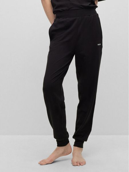 Hugo Spodnie dresowe 50490578 Czarny Regular Fit. Czarne spodnie dresowe damskie Hugo, xs, bez wzorów, z bawełny. Za 199.99 zł.