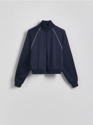 Rozpinana bluza ze stójką - granatowy. Niebieskie bluzy damskie Reserved, l, bez wzorów, z dzianiny, bez kaptura. W wyprzedaży za 69.99 zł.