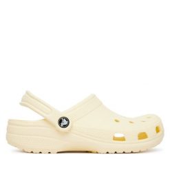 Klapki Crocs. Żółte klapki damskie Crocs, bez wzorów, bez obcasa, bez zapięcia. Za 239.99 zł.