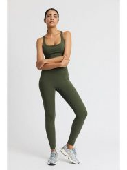 Rethinkit Legginsy sportowe "All day" w kolorze zielonym rozmiar: L. Zielone legginsy damskie Rethinkit, l, bez wzorów, z materiału. Za 116.45 zł.