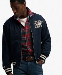 Superdry Kurtka Bomber Twill Varsity z mieszanki bawełny. Niebieskie kurtki damskie Superdry, m, bez wzorów, z bawełny, bez kaptura. Za 304.00 zł.
