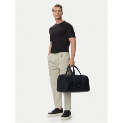 Torba weekendowa Tommy Hilfiger. Czarne torby podróżne Tommy Hilfiger, bez wzorów. Za 649.99 zł.