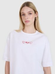4F T-shirt oversize z nadrukiem damski - biały L. Białe t-shirty damskie 4F, l, bez wzorów, z bawełny, bez kołnierzyka. W wyprzedaży za 39.99 zł.