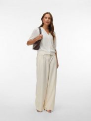 Vero Moda Kardigan w kolorze kremowym rozmiar: XS. Brązowe kardigany damskie Vero Moda, s, bez wzorów, z wiskozy. Za 52.92 zł.