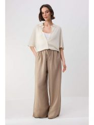Trendyol Bluzka w kolorze beżowym rozmiar: Standart. Brązowe bluzki damskie Trendyol, bez wzorów, prążkowane, bez kołnierzyka, bez ramiączek. Za 86.99 zł.