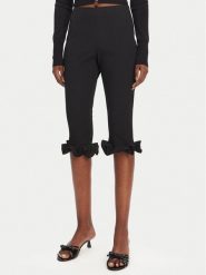 ROTATE Spodnie capri 113809100 Czarny Slim Fit. Czarne spodnie materiałowe damskie ROTATE, bez wzorów, z materiału. Za 409.99 zł.