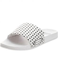 Klapki damskie Champion Ibiza Slide. Białe klapki damskie Champion, bez wzorów, z materiału, bez obcasa, bez zapięcia. Za 47.40 zł.