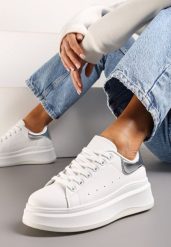 Biało-Srebrne Sznurowane Sneakersy z Imitacji Skóry na Platformie Filamena. Białe obuwie sportowe damskie Renee, ze skóry, bez zapięcia. Za 79.99 zł.