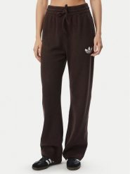 Adidas Spodnie dresowe Essentials IA4437 Brązowy Loose Fit. Brązowe spodnie dresowe damskie Adidas, s, bez wzorów, z bawełny. Za 298.99 zł.