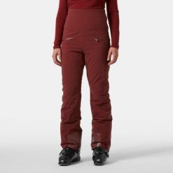 Spodnie narciarskie dla kobiet Helly Hansen Alphelia Hi Waist. Czerwone spodnie sportowe damskie Helly Hansen, na zimę, bez wzorów, narciarskie. W wyprzedaży za 1,207.50 zł.