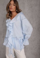 Niebieska Eteryczna Bluzka z Bawełny Zdobiona Falbankami i Ściągaczem w Pasie Cezarelle. Niebieskie bluzki damskie Renee, l, z aplikacjami, z bawełny, bez kołnierzyka, bez ramiączek. Za 159.99 zł.