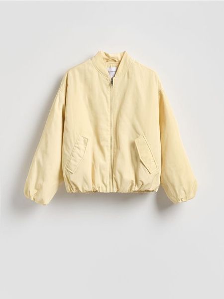 Kurtka bomber - jasnożółty. Żółte kurtki damskie Reserved, l, bez wzorów, z tkaniny, bez kaptura. Za 199.99 zł.