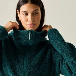 Damska bluza polarowa Elindra z wodoodpornym zamkiem do połowy. Niebieskie bluzy damskie Regatta, l, bez wzorów, z materiału, bez kaptura. Za 227.00 zł.