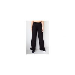 Spodnie dresowe damskie szerokie 2skin I love pilates black. Czarne spodnie dresowe damskie 2SkIN, bez wzorów, z dresówki. Za 259.00 zł.