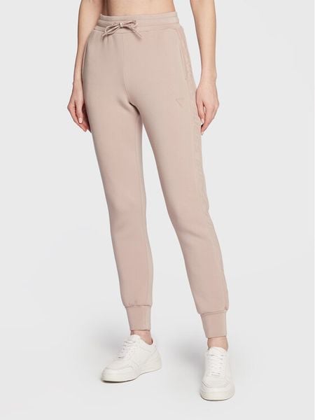 Guess Spodnie dresowe Allie Scuba V2YB18 K7UW2 Beżowy Regular Fit. Brązowe spodnie dresowe damskie Guess, xxs, z aplikacjami, z dresówki. Za 365.00 zł.
