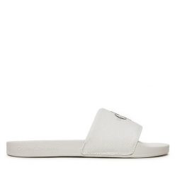 Klapki Calvin Klein Jeans. Białe klapki damskie Calvin Klein Jeans, bez wzorów, z jeansu, bez obcasa, bez zapięcia. Za 109.99 zł.