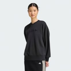 Bluza Seasonal Essentials Satin V-Neck. Czarne bluzy damskie Adidas, s, bez wzorów, z bawełny, bez kaptura. Za 239.00 zł.