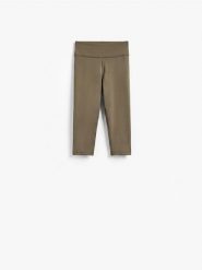 Legginsy capri - ciemnozielony. Zielone legginsy damskie Reserved, l, bez wzorów, z dzianiny. Za 69.99 zł.