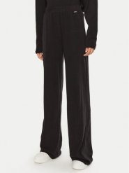 Guess Spodnie dresowe O4BB02 KCHZ2 Czarny Relaxed Fit. Czarne spodnie dresowe damskie Guess, m, z aplikacjami, z bawełny. Za 179.99 zł.