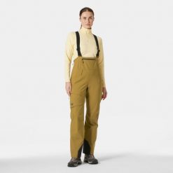 Damskie spodnie narciarskie na szelkach Helly Hansen Verglas BC. Brązowe spodnie sportowe damskie Helly Hansen, na zimę, bez wzorów, narciarskie. Za 1,314.50 zł.