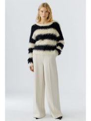 Oui Spodnie w kolorze kremowym rozmiar: 38. Brązowe spodnie materiałowe damskie Oui, bez wzorów, z materiału. Za 360.17 zł.