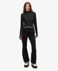 Superdry Luxe Ski Pants – Oddychające i wodoodporne spodnie narciarskie. Czarne spodnie sportowe damskie Superdry, bez wzorów, z elastanu, narciarskie. Za 791.80 zł.