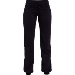 Casall PLOW Spodnie treningowe black. Czarne spodnie dresowe damskie Casall, z elastanu. Za 289.00 zł.