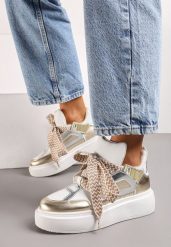 Białol-Złote Sneakersy na Grubej Podeszwie z Ozdobnymi Sznurówkami Edidda. Żółte obuwie sportowe damskie Born2be, z materiału, bez zapięcia. Za 109.99 zł.
