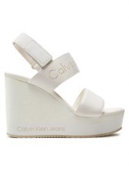 Calvin Klein Jeans Sandały Wedge Sandal Webbing In Mr YW0YW01360 Biały. Białe sandały damskie Calvin Klein Jeans, bez wzorów, z jeansu, bez obcasa, na koturnie, bez zapięcia. Za 319.99 zł.