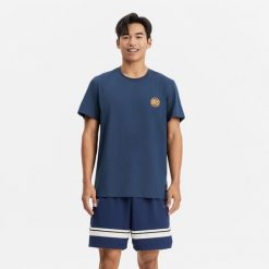 Koszulka koszykówki unisex Tarmak NBA Knicks TS 900. Niebieskie koszulki damskie TARMAK, s, bez wzorów, z bawełny, bez kołnierzyka, bez ramiączek. Za 79.99 zł.