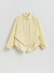 Bawełniana koszula w paski - jasnożółty. Żółte koszule damskie Reserved, l, bez wzorów, z bawełny, bez kołnierzyka, bez ramiączek. Za 139.99 zł.