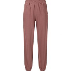 Damskie spodnie dresowe Athlecia Carmen. Brązowe spodnie dresowe damskie Athlecia, bez wzorów, z dresówki. Za 180.00 zł.