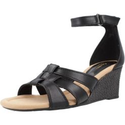 Sandały CLARKS KYARRA JOY Czarny. Czarne sandały damskie Clarks, bez wzorów, ze skóry, bez obcasa, bez zapięcia. Za 194.99 zł.