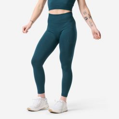 Legginsy do treningu siłowego damskie Domyos bezszwowe. Niebieskie legginsy damskie DOMYOS, l, bez wzorów, z dzianiny. Za 99.99 zł.