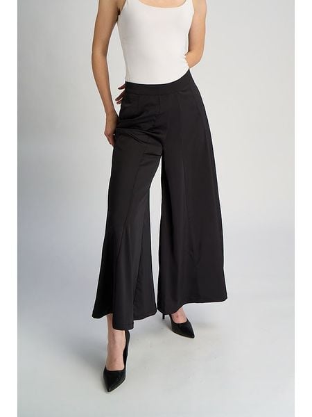 Marks & Spencer Spodnie w kolorze czarnym rozmiar: 36. Czarne spodnie materiałowe damskie Marks & Spencer, bez wzorów, z materiału. Za 69.58 zł.