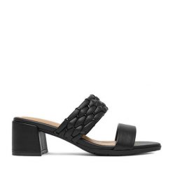 Klapki JENNY. Czarne klapki damskie Jenny, bez wzorów, bez obcasa, bez zapięcia. Za 129.99 zł.