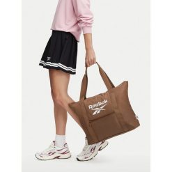 Torebka Reebok. Brązowe shopper bag Reebok, bez wzorów, bez dodatków. Za 79.99 zł.