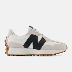 Buty damskie New Balance 327 beżowe. Brązowe obuwie sportowe damskie New Balance, z zamszu, bez zapięcia. Za 489.00 zł.