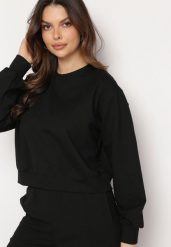 Czarna Bawełniana Bluza Oversize o Krótszym Kroju Vesperana. Czarne bluzy damskie Born2be, l, bez wzorów, z bawełny, bez kaptura. Za 99.99 zł.