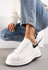 Biało-Czarne Sznurowane Sneakersy z Imitacji Skóry na Platformie Filamena. Białe obuwie sportowe damskie Renee, ze skóry, bez zapięcia. Za 79.99 zł.