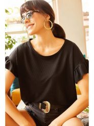 Trendyol Koszulka w kolorze czarnym rozmiar: L. Czarne koszulki damskie Trendyol, l, bez wzorów, z bawełny, bez kołnierzyka, bez ramiączek. Za 32.98 zł.